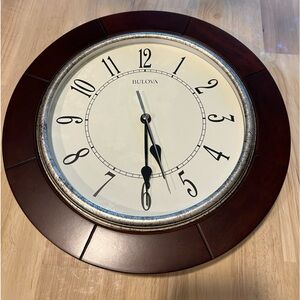 Bulova silent sweep 12” wall clock / housing is plastic